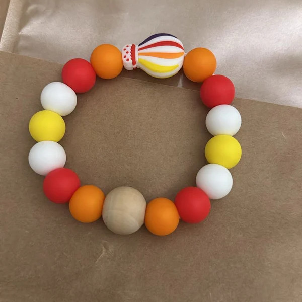 Anneau de dentition - Montgolfière Orange - Anneau de dentition - Montgolfière Orange -