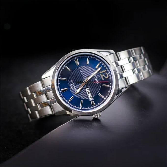 Casio – Au fond bleu texturé avec dateur sur 3h et tout en acier inoxydable pour hommes – MTP-1335D-2AVDF