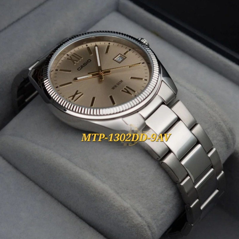 Casio – Montre classique fond doré pour hommes – Tout en acier inoxydable – Avec dateur – MTP-1302DD-9AV