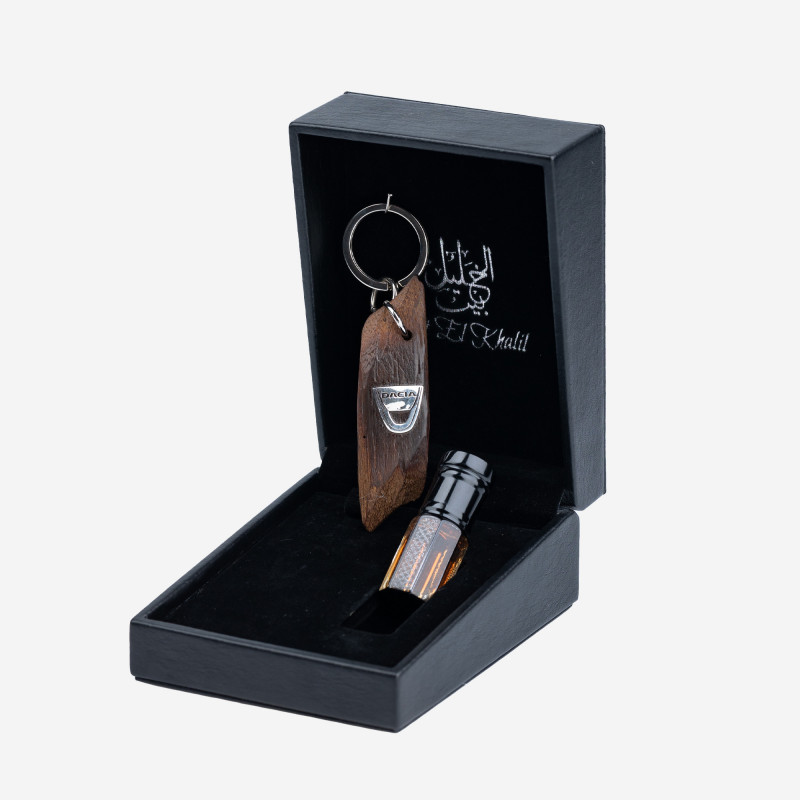 Porte clé Oud Qmari - DACIA - - Or